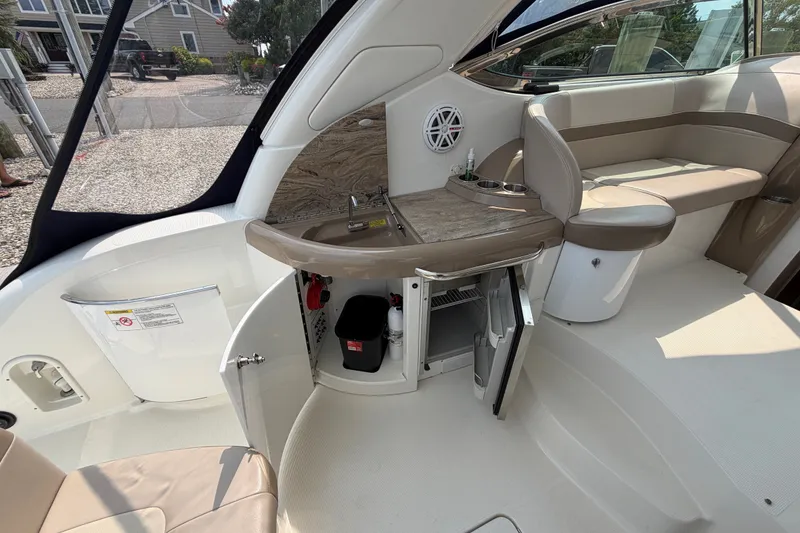 Slide: The Image of Interior of 2016 Formula 37 Performance Cruiser with seating and kitchenette area. - 6