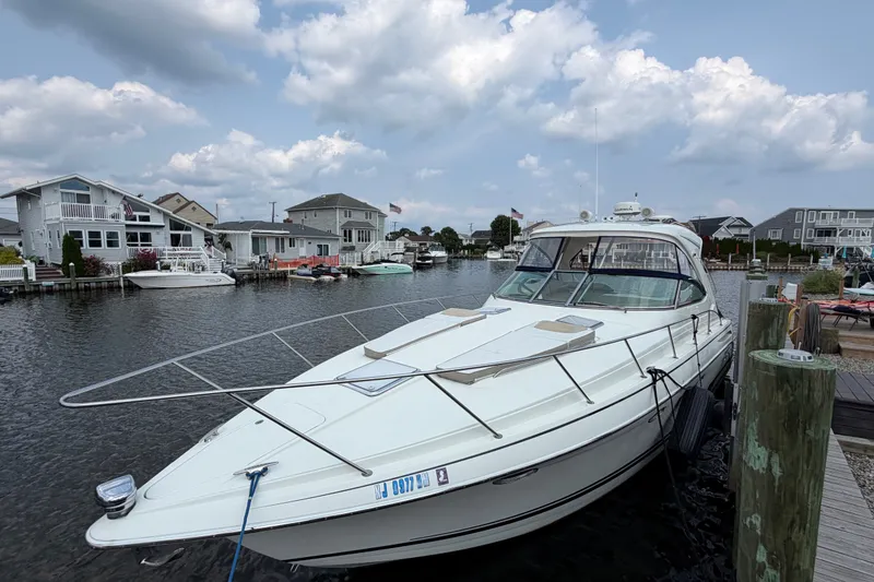 Slide: The Image of 2016 Formula 37 Performance Cruiser docked in a scenic waterfront neighborhood. - 3