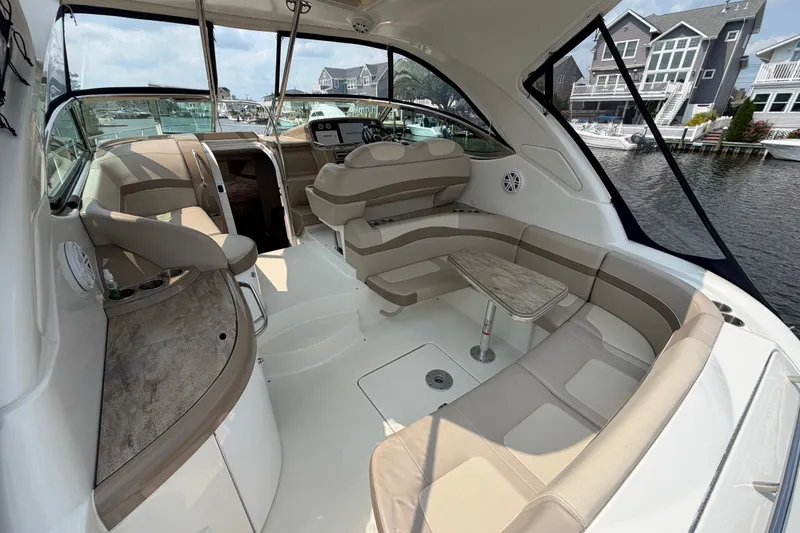 Slide: The Image of 2016 Formula 37 Performance Cruiser interior with elegant seating and waterfront view. - 4