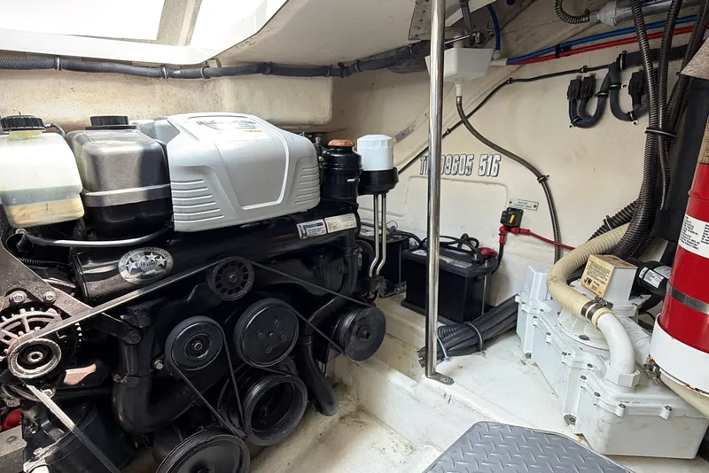 Slide: The Image of Engine room of a 2016 Formula 37 Performance Cruiser with visible components and wiring. - 48