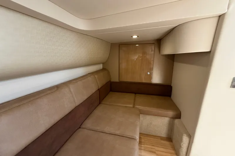 Slide: The Image of Interior of 2016 Formula 37 Performance Cruiser with beige seating and wooden accents. - 34