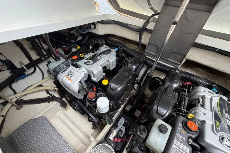 Slide: The Image of Engine compartment of a 2016 Formula 37 Performance Cruiser, showcasing dual engines and components. - 46