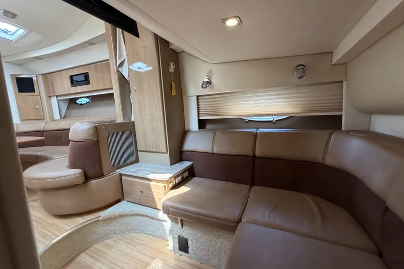 Slide: The Image of Interior of a 2016 Formula 37 Performance Cruiser with elegant seating and wood accents. - 35