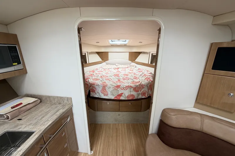 Slide: The Image of Interior of 2016 Formula 37 Performance Cruiser with cozy bed and modern amenities. - 21