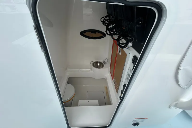 Slide: The Image of Interior view of 2027 Contender 30 ST boat cabin with sink and toilet. - 21
