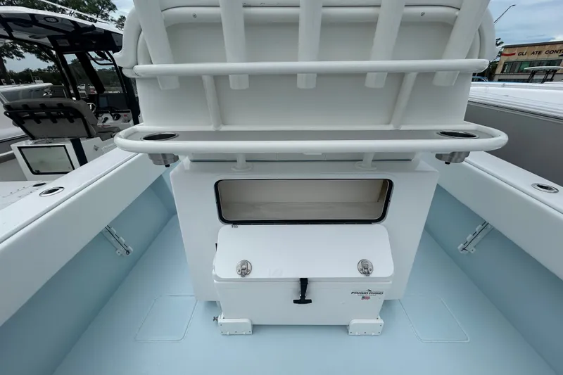 Slide: The Image of 2027 Contender 30 ST boat interior with storage and seating area. - 26