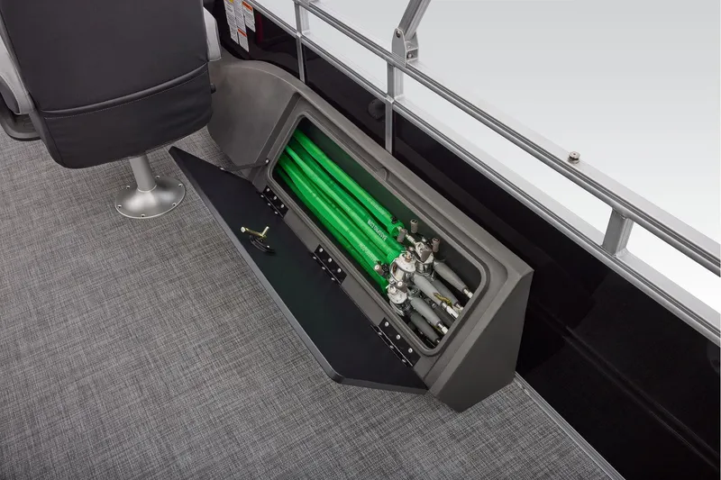 Slide: The Image of Manufacturer Provided Image: 2026 Sun Tracker SportFish 22 DLX boat storage compartment with fishing rod holders. - 54