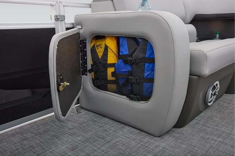 Slide: The Image of Manufacturer Provided Image: Storage compartment with life jackets in 2026 Sun Tracker SportFish 22 DLX boat. - 30