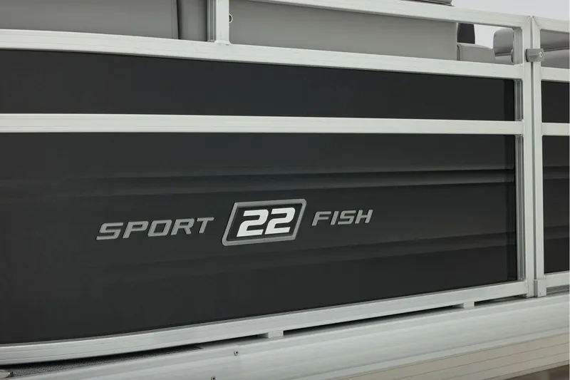 Slide: The Image of Manufacturer Provided Image: 2026 Sun Tracker SportFish 22 DLX pontoon boat side view with model branding. - 66