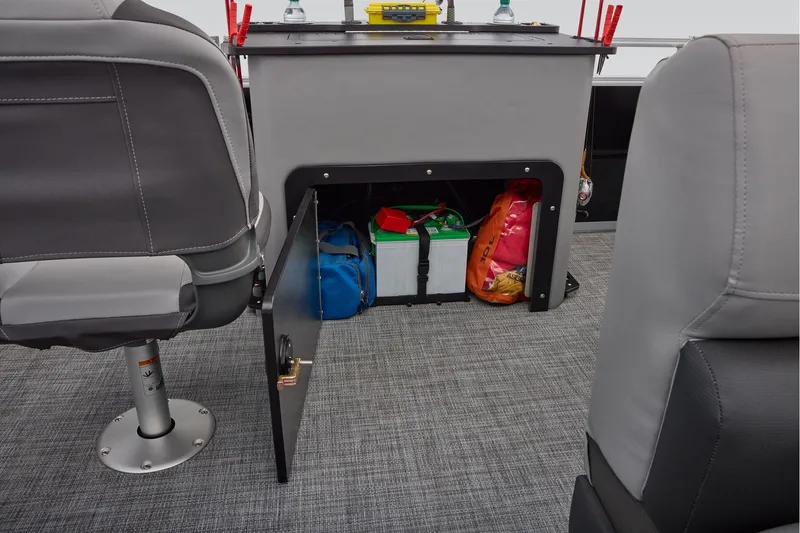 Slide: The Image of Manufacturer Provided Image: Interior storage of 2026 Sun Tracker SportFish 22 DLX boat with open compartment. - 59