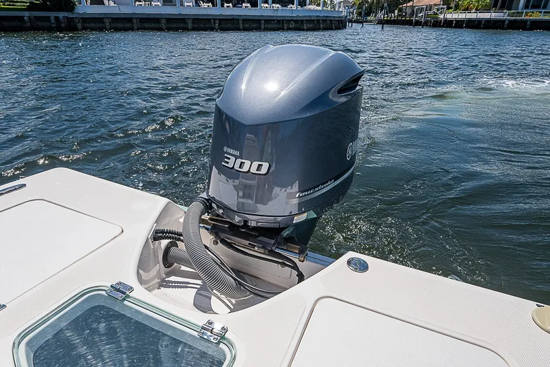 Slide: The Image of 2012 Everglades 243 Center Console with Yamaha 300 outboard engine on water. - 16