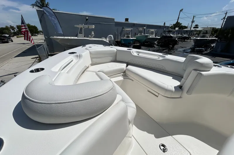 Slide: The Image of 2026 Key West 249 FS boat interior with luxurious white seating and modern design. - 5