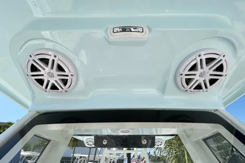 Slide: The Image of 2026 Key West 249 FS boat speakers and lighting on the interior ceiling. - 12