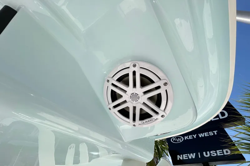 Slide: The Image of 2026 Key West 249 FS boat with JL Audio speaker, showcasing sleek design. - 19