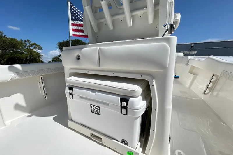 Slide: The Image of 2026 Key West 249 FS boat interior with cooler and American flag. - 3