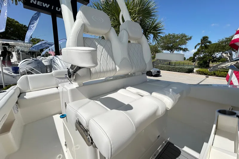 Slide: The Image of 2026 Key West 249 FS boat interior with luxurious white seating and modern design. - 15