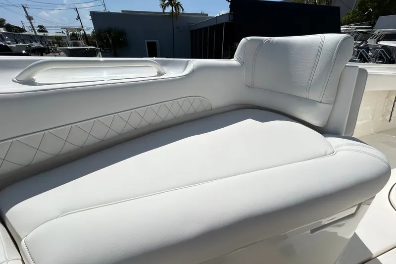 Slide: The Image of Luxurious seating on 2026 Key West 249 FS boat, featuring white upholstery and elegant stitching. - 7
