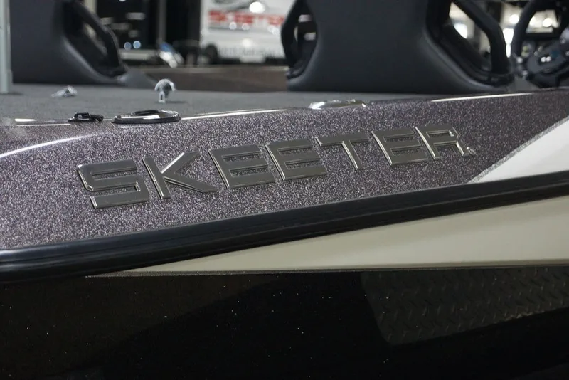 Slide: The Image of 2023 Skeeter ZXR21 boat with metallic logo detail. - 22