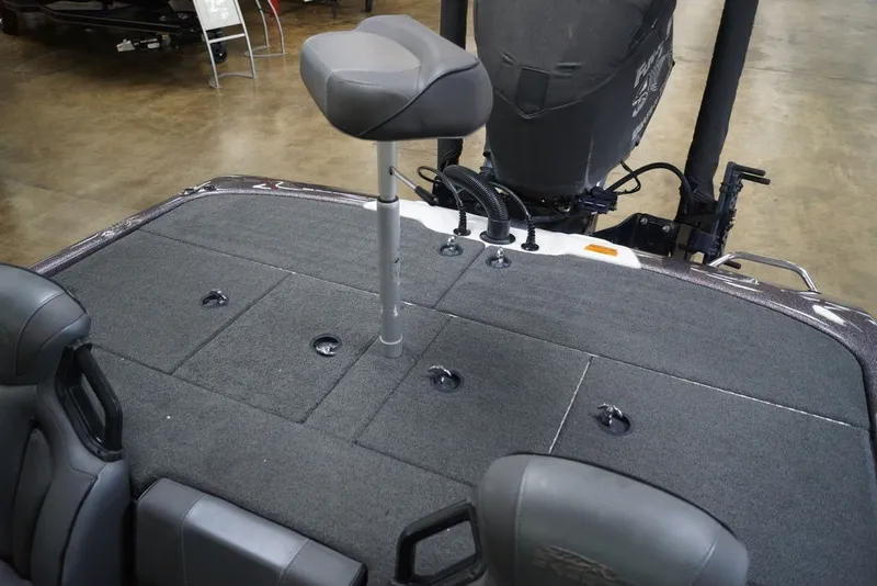Slide: The Image of 2023 Skeeter ZXR21 boat deck with seating and storage compartments. - 18
