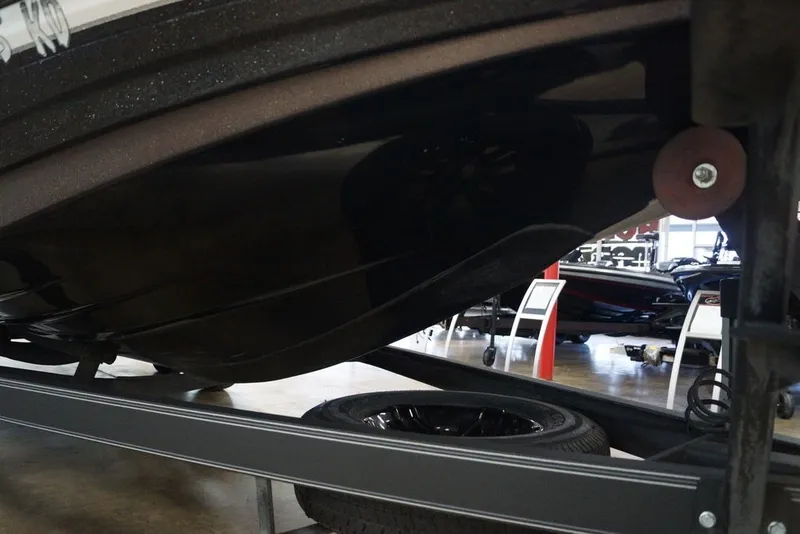 Slide: The Image of 2023 Skeeter ZXR21 boat hull on trailer, showcasing sleek design and sturdy construction. - 9