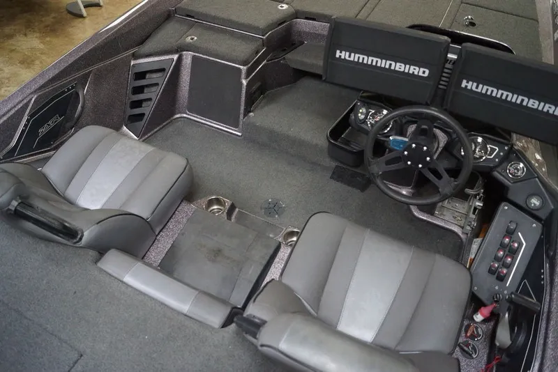 Slide: The Image of 2023 Skeeter ZXR21 boat interior with dual seats and Humminbird electronics. - 20