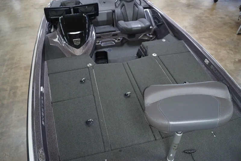 Slide: The Image of 2023 Skeeter ZXR21 boat interior with seating and storage compartments. - 10