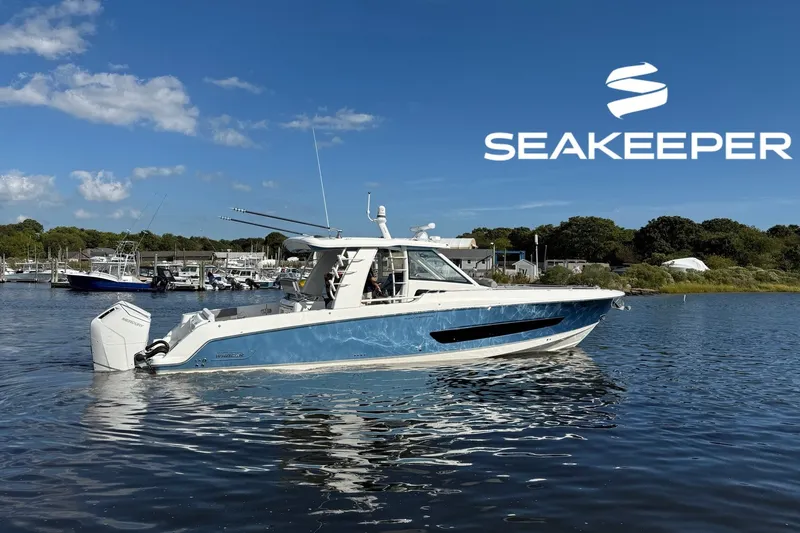 The Image of 2024 Boston Whaler 420 Outrage boat on water, featuring Seakeeper stabilization technology. - 0