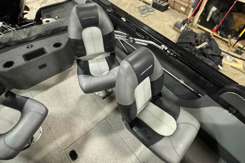 Slide: The Image of 2020 Crestliner 1850 Super Hawk interior with gray and black seating. - 11