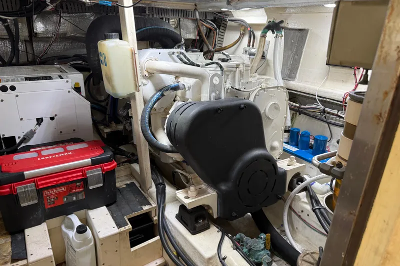Slide: The Image of Engine room of a 1998 Dorado 36 Express with tools and equipment. - 47