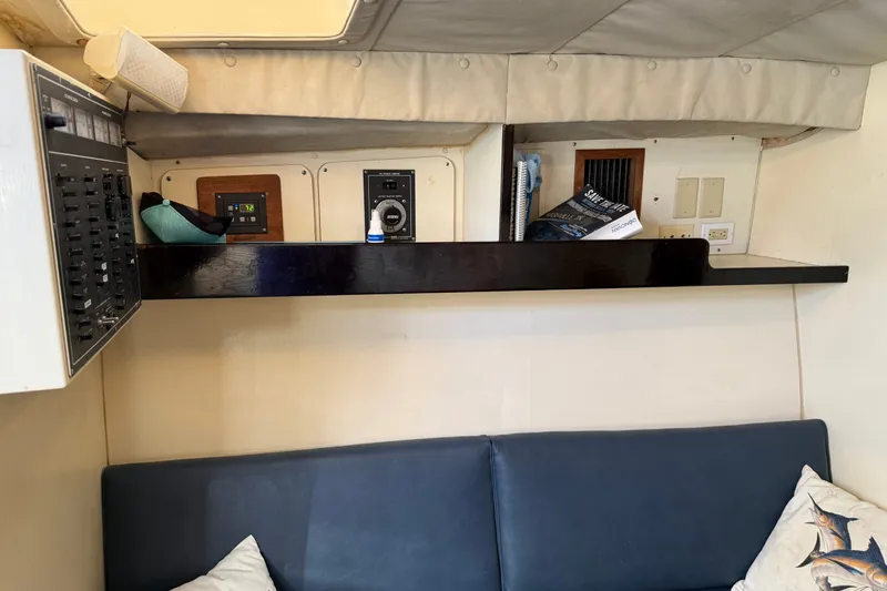 Slide: The Image of Interior of 1998 Dorado 36 Express boat with control panel and seating area. - 40