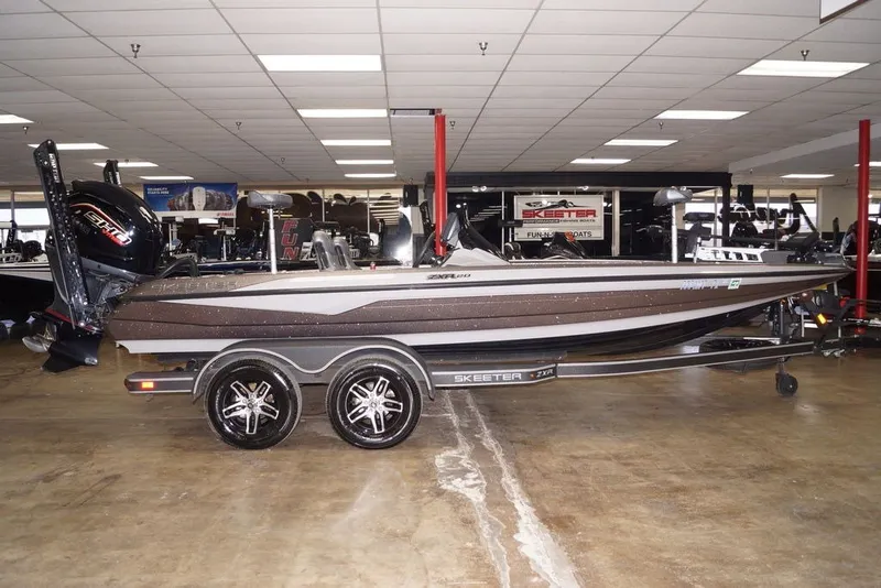 The Image of 2025 Skeeter ZXR20 boat displayed indoors on a trailer. - 0