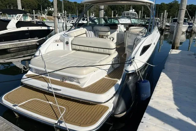 Slide: The Image of 2016 Cobalt 336 boat docked, featuring spacious seating and elegant design. - 3