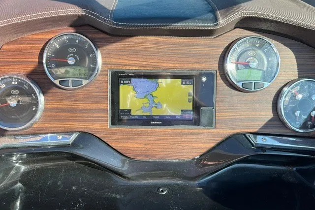 Slide: The Image of Dashboard of a 2016 Cobalt 336 boat with GPS and gauges. - 11