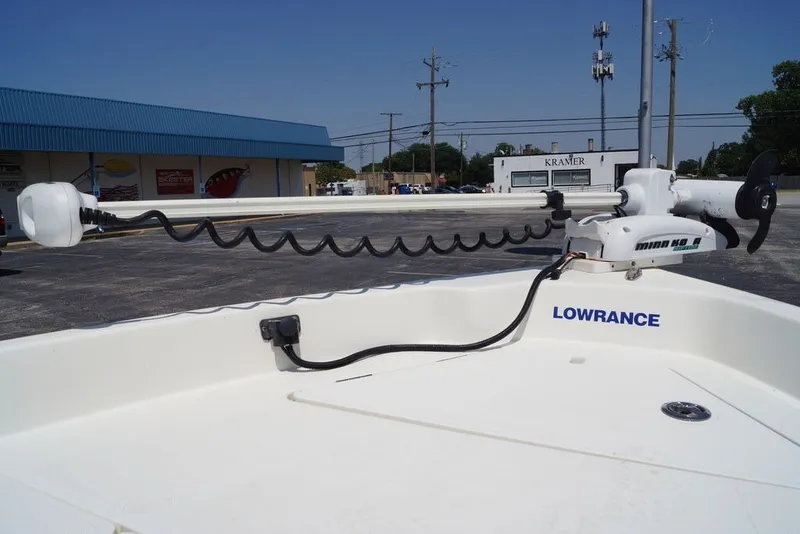 Slide: The Image of 2025 Skeeter SX2250 boat with Minn Kota trolling motor and Lowrance electronics. - 14