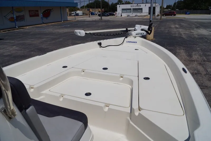 Slide: The Image of 2025 Skeeter SX2250 boat deck with Lowrance equipment in a parking lot. - 22