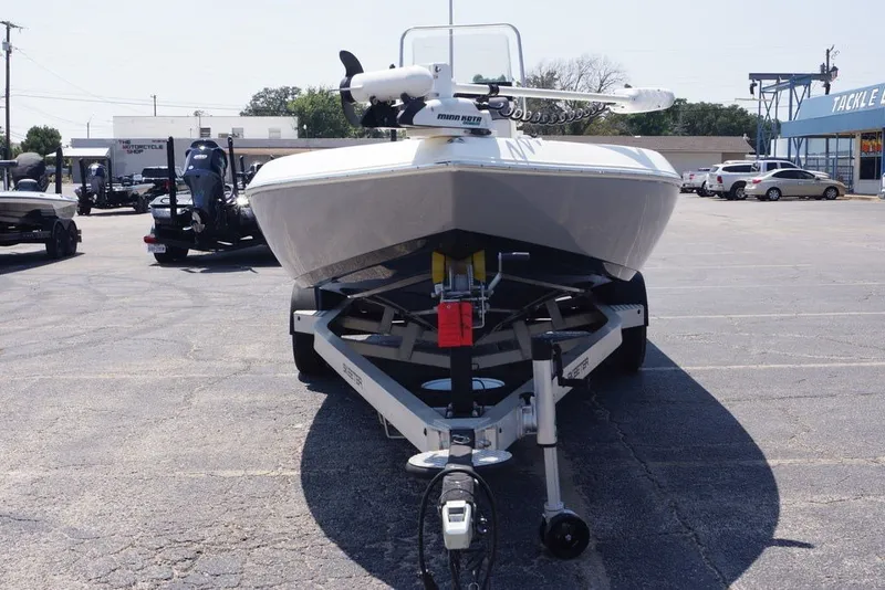 Slide: The Image of 2025 Skeeter SX2250 boat on trailer in parking lot, front view. - 4