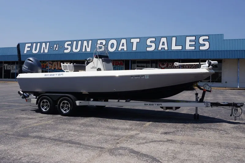 The Image of 2025 Skeeter SX2250 boat on trailer at Fun-N-Sun Boat Sales dealership. - 1