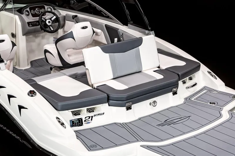 Slide: The Image of Manufacturer Provided Image: 2021 Chaparral 21 SSi boat interior with gray and white seating and dashboard. - 14