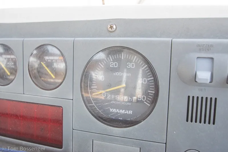 Slide: The Image of Dashboard of a 1988 Hylas 44 Center Cockpit with Yanmar engine gauges. - 78