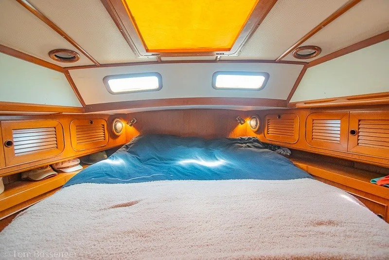 Slide: The Image of Cozy cabin interior of 1988 Hylas 44 Center Cockpit sailboat with wooden accents. - 22