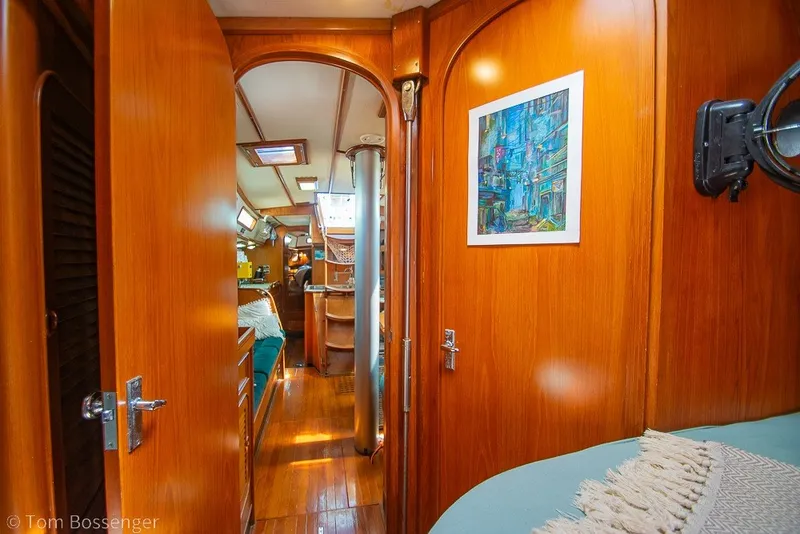 Slide: The Image of Interior of 1988 Hylas 44 Center Cockpit yacht with wooden finish and cozy cabin. - 31