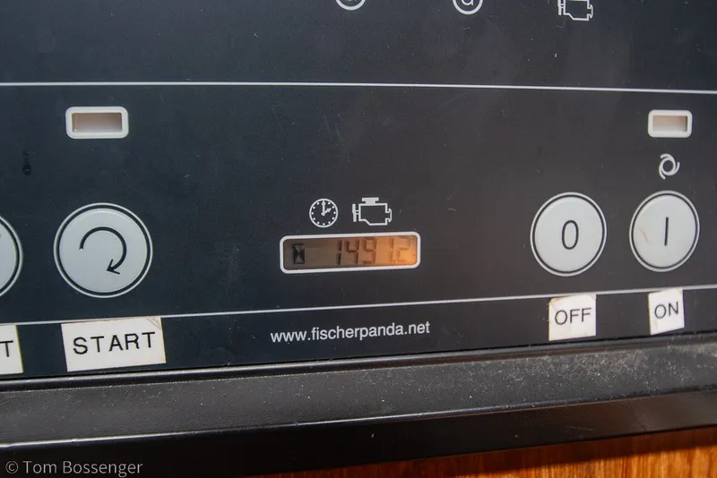 Slide: The Image of Control panel of a 1988 Hylas 44 Center Cockpit yacht, displaying engine hours. - 86