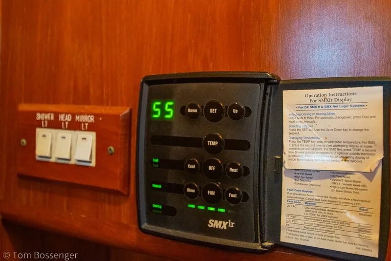 Slide: The Image of Control panel and switches inside a 1988 Hylas 44 Center Cockpit yacht. - 43
