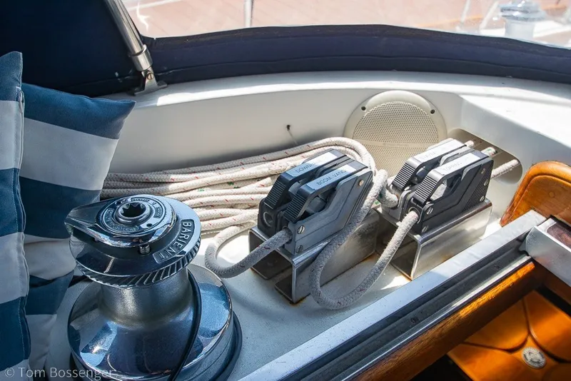 Slide: The Image of Cockpit of 1988 Hylas 44 Center, featuring winch and rope clutches. - 63