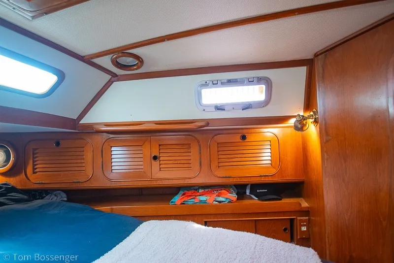 Slide: The Image of Cozy cabin interior of 1988 Hylas 44 Center Cockpit sailboat with wooden cabinetry. - 27