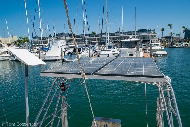 Slide: The Image of Sailboat with solar panels docked at marina, Hylas 44 Center Cockpit, 1988 model. - 55