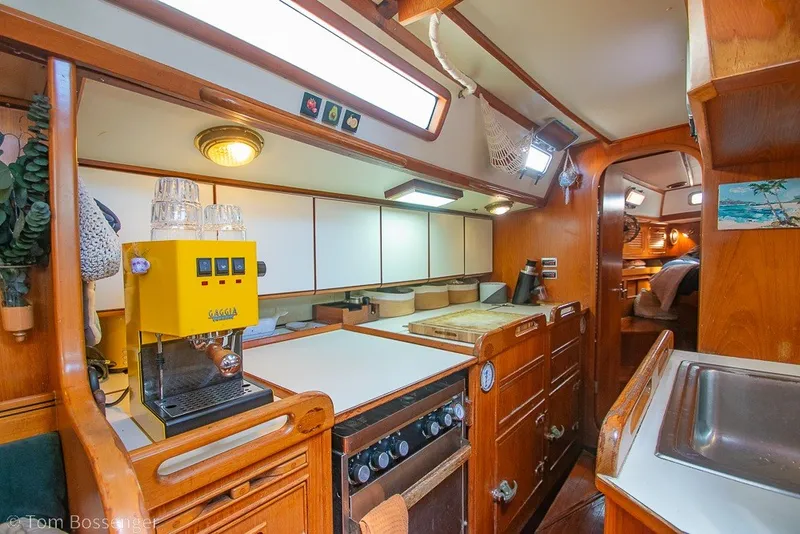 Slide: The Image of Interior of 1988 Hylas 44 Center Cockpit yacht with kitchen and espresso machine. - 15