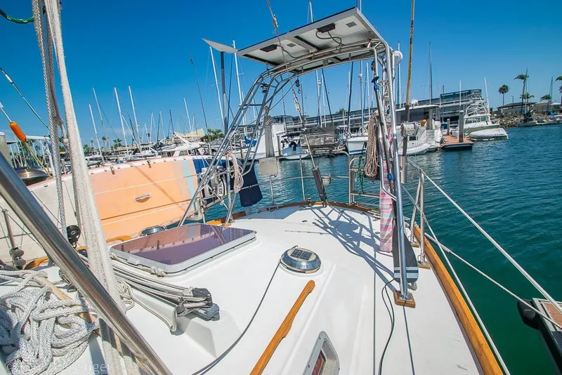 Slide: The Image of Sailboat docked in marina, Hylas 44 Center Cockpit, 1988 model, sunny day. - 51