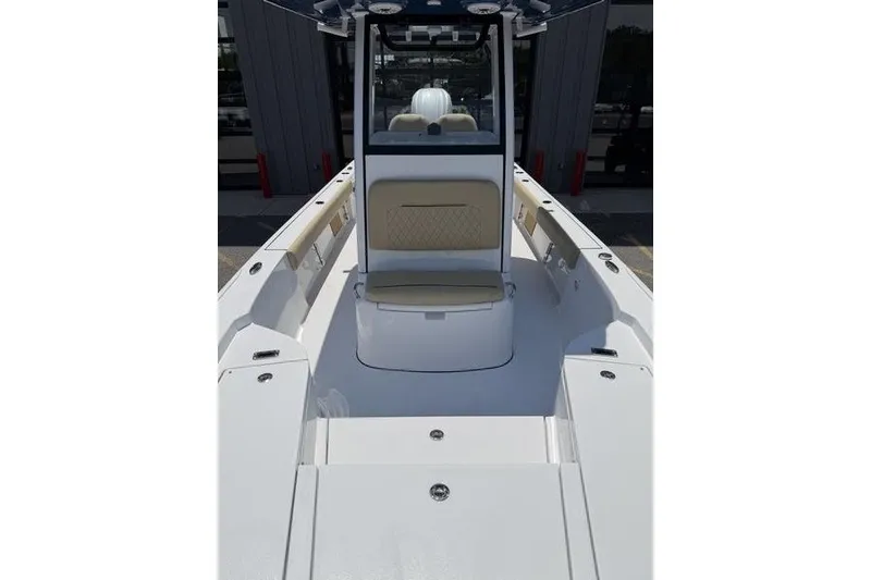 Slide: The Image of 2027 Sportsman Masters 247 Bay Boat interior with seating and storage compartments. - 3