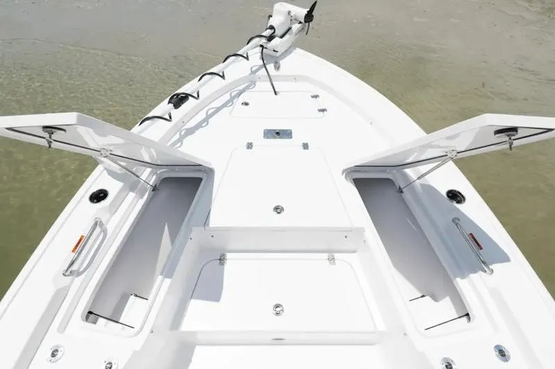 Slide: The Image of 2027 Sportsman Masters 247 Bay Boat deck with open storage compartments. - 29